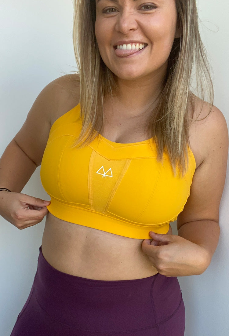 Maaree founder mari in yellow solidarity sports bra