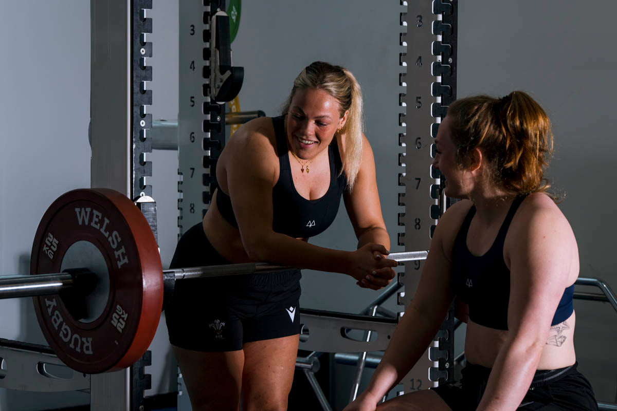 Welsh Rugby Players Women In gym wearing MAAREE black Empower Sports Bra